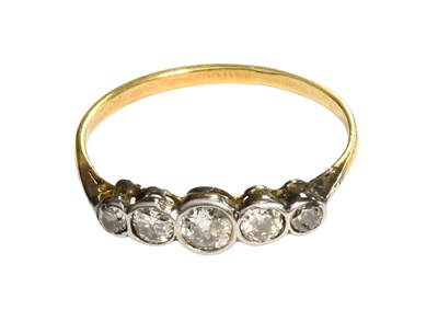 Lot 211 - A Diamond Five Stone Ring, the graduated round...