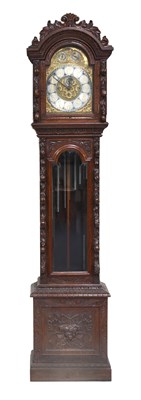 Lot 272 - A Carved Oak Eight Day Tubular Bell Chiming...