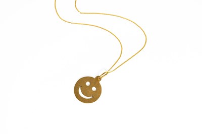 Lot 179 - A 9 Carat Gold Pendant on Chain, the smiley...