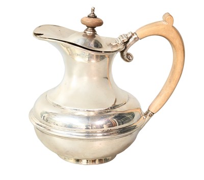 Lot 24 - A George V Silver Hot-Water Jug, by S. W....