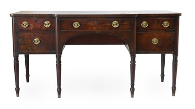 Lot 516 - A George IV Mahogany Inverted Breakfront...