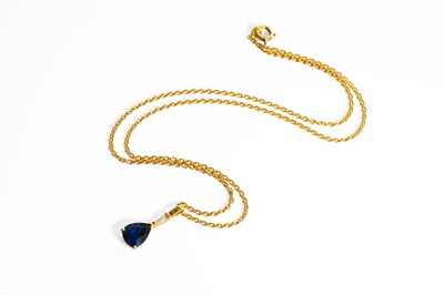 Lot 185 - A Sapphire and Diamond Drop Pendant on Chain,...