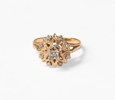 Lot 162 - A Diamond Cluster Ring, of yellow textured...