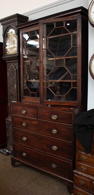 Lot 1254 - A George III Mahogany Bookcase, the astragal...