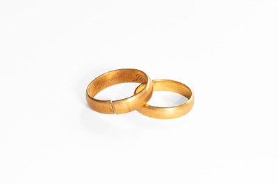 Lot 219 - An 18 Carat Gold Band Ring, finger size M; and...