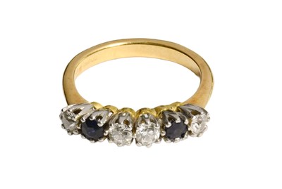 Lot 221 - An 18 Carat Gold Sapphire and Diamond Six...