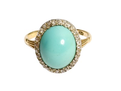 Lot 204 - A Turquoise and Diamond Cluster Ring, the oval...