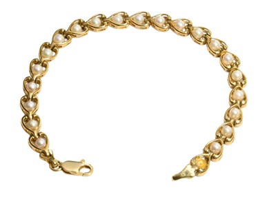Lot 223 - A 9 Carat Gold Cultured Pearl Bracelet, each...