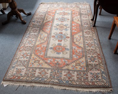 Lot 1139 - Melas Rug, the narrow ivory field framed by...