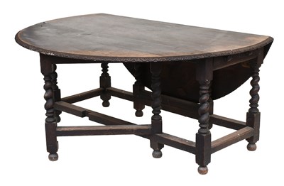 Lot 1304 - An Oak Gateleg Dining Table, on turned and...