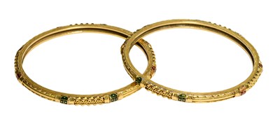 Lot 222 - Two Enamel Bangles, the yellow bands with rope...