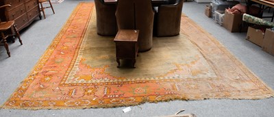 Lot 1133 - Ushak Carpet, the plain field centred by a...