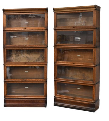 Lot 1259 - Two Early 20th Century Oak Globe Wernicke...