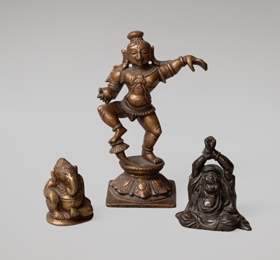 Lot 275 - A Japanese Patinated Bronze Figure of a Seated...