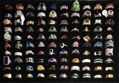 Lot 242 - One Hundred Dress Rings, of varying design and...