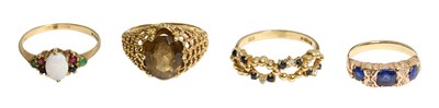 Lot 207 - A 9 Carat Gold Smoky Quartz Ring, finger size...