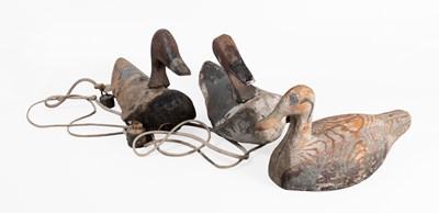 Lot 181 - Three Decoy Ducks, early 20th century, carved,...
