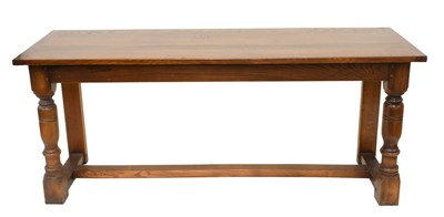Lot 1240 - A 20th Century Oak Refectory Table, the floor...