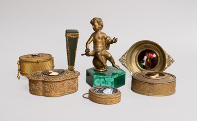 Lot 274 - A Gilt Metal Figure of a Putto on a Malachite...