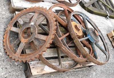 Lot 624 - Four Six-Spoke Cast Iron Cart Wheels, three...