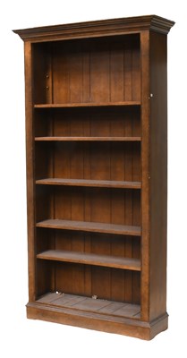 Lot 1196 - A 20th Century Oak Bookshelf with adjustable...