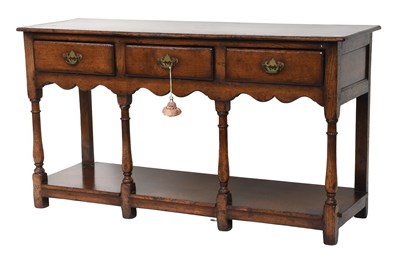 Lot 1197 - A Titchmarsh & Goodwin Style Oak Three Drawer...