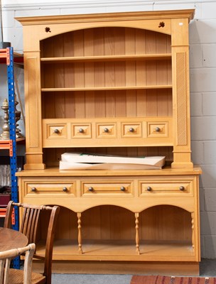 Lot 1268 - A Modern Light Oak Dresser and Rack, the...