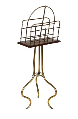 Lot 1278 - An Oak and Brass Magazine Stand with Art...