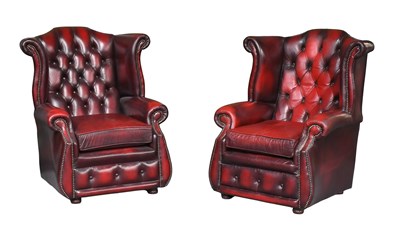 Lot 1296 - A Pair of Reproduction Ox Blood Buttoned...