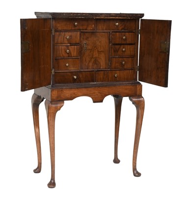 Lot 1440 - An 18th-Century Walnut Feather-Banded Chest on...