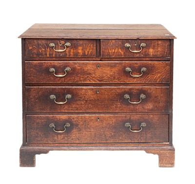 Lot 1389 - A George III Oak Chest of Drawers, straight...