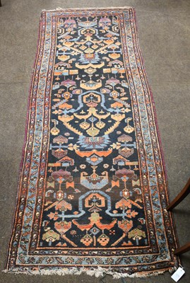 Lot 1275 - Hamadan Runner, the charcoal field of stylised...