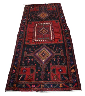 Lot 1277 - Hamadan Long Rug, the charcoal field centred...