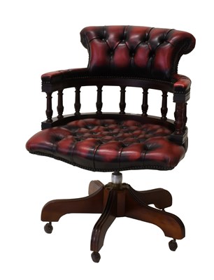 Lot 1411 - A Reproduction Ox Blood Leather Button...