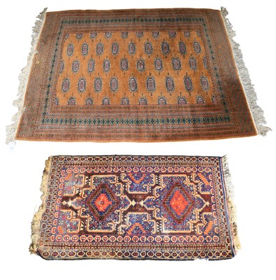 Lot 1289 - "Bukhara" Rug, the mustard field with columns...
