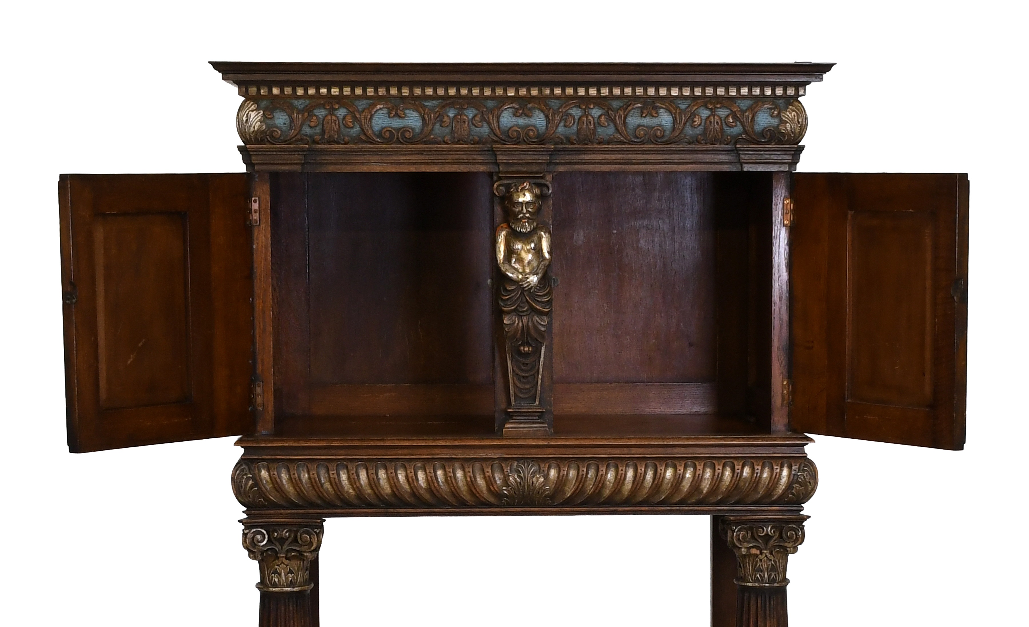 A Dining Room Suite, in Renaissance style, comprising: