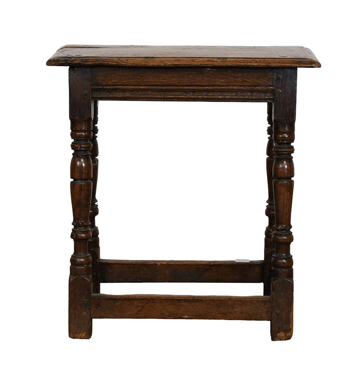 Lot 375 - An Oak Joint Stool, circa 1650, of four-peg