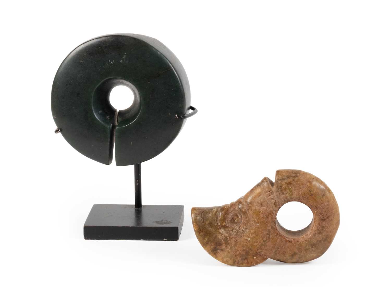 Lot 171 - A Chinese Dark Green Jade Split Ring,