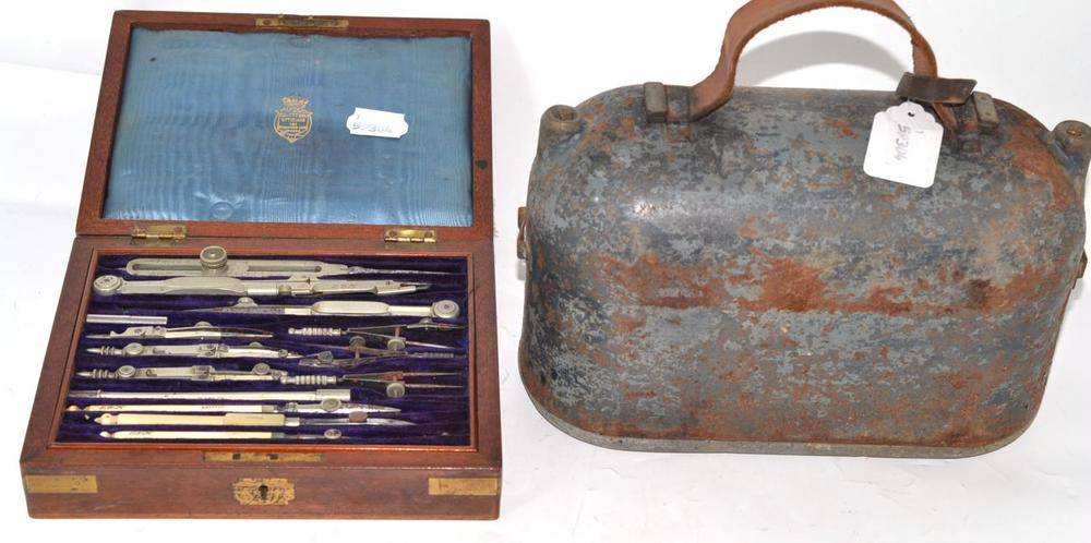 Lot 192 - A cased drawing set and a cased sight/level