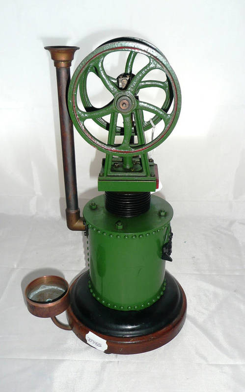 Lot 1054 - A Heinrici Vertical Hot Air Engine, with twin flywheels raised above the green and black...