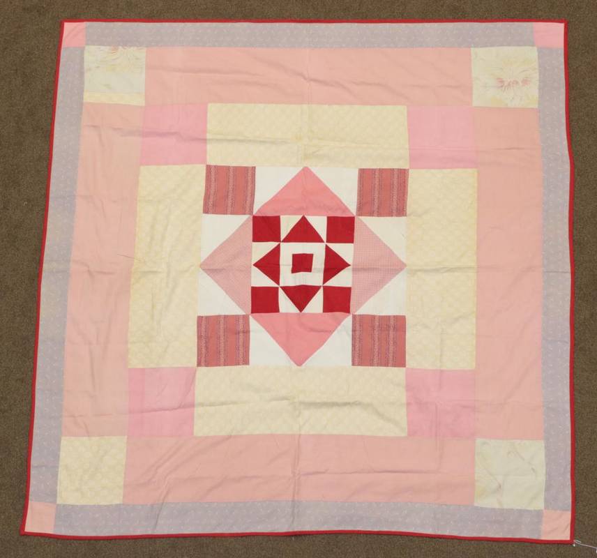 Lot 2022 - 19th Century Patchwork Cover, with a central turkey red and white square comprising squares and...