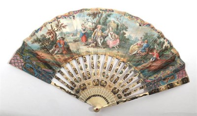 Lot 2026 - A Mid-18th Century Ivory Fan, the monture carved and pierced, silvered and gilded. The guards...