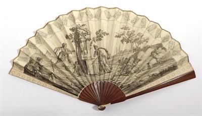 Lot 2100 - A Slender Wooden Fan, with ivory thumb guards dating from the late 18th or early 19th century,...