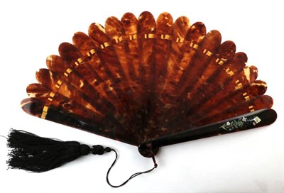 Lot 2121 - A Large Late 19th Century Tortoiseshell Brisé Fan, with eighteen plain but well mottled inner...