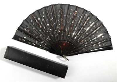 Lot 2122 - A Small and Elegant Early 20th Century Tortoiseshell Fan, the single black gauze leaf...