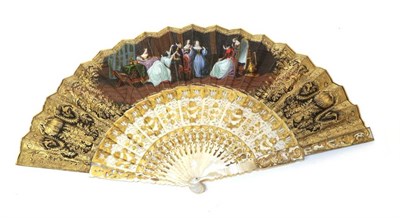 Lot 2135 - A Circa 1850's Mother-of-Pearl Fan, the monture carved and heavily gilded in the Spanish style, the