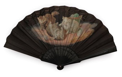 Lot 2143 - Playtime! A Late 19th Century Black Silk Fan, the monture of carved and pierced black wood, the...