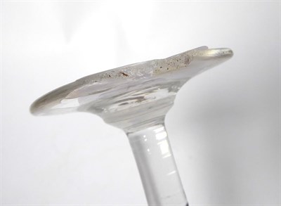 Lot 31 - A Wine Glass, circa 1750, the ovoid bowl with basal blade knop on a plain stem with annular...