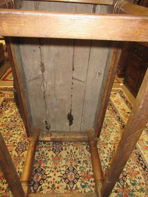 Lot 470 - ~ A Joined Oak Refectory Style Dining Table, basically 18th century, the plank top above a...