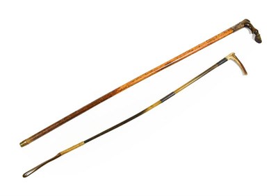 Lot 24 - A Late Victorian/Edwardian Lady's Rhinoceros Horn Riding Crop, with antler handle, silver...